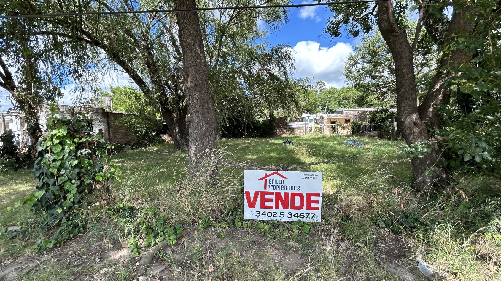 terreno con casa a demoler