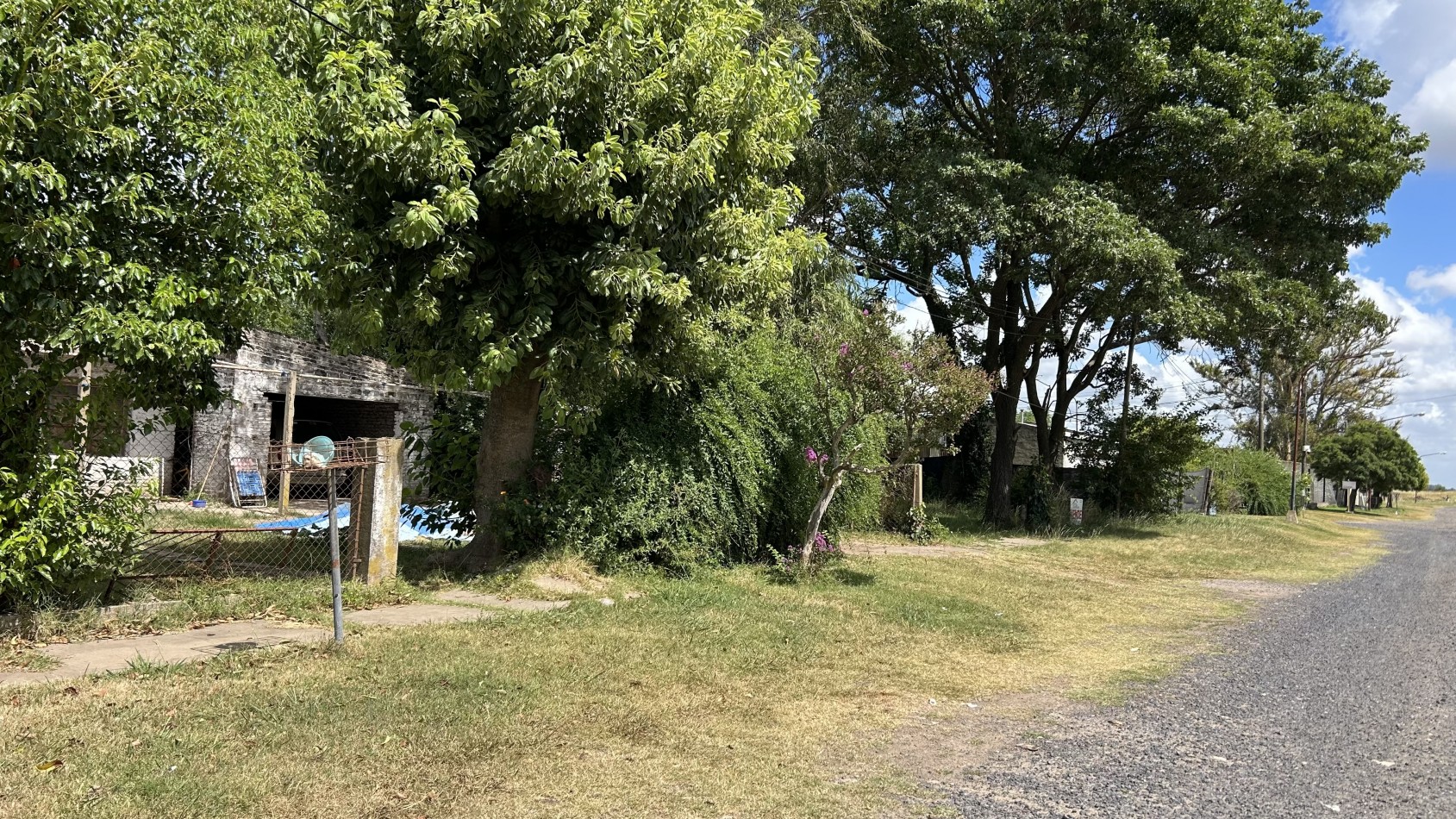 terreno con casa a demoler